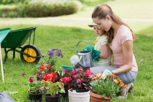 Clipboard with a written no-obligation quote for lawn care